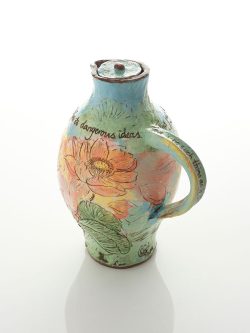 Small decorated jug and cover